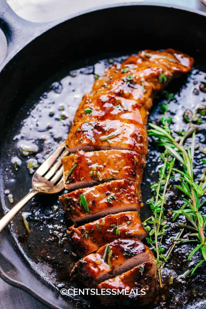 Honey Garlic Roasted Pork Tenderloin in a skillet