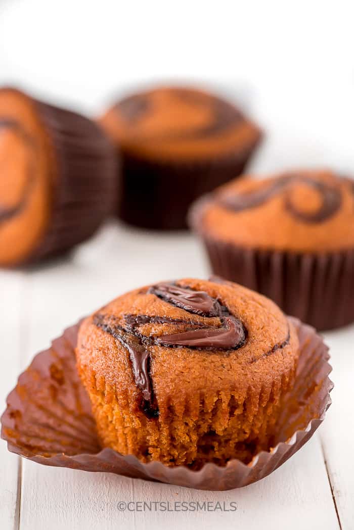 Pumpkin muffins with swirls of Nutella on top and in the middle