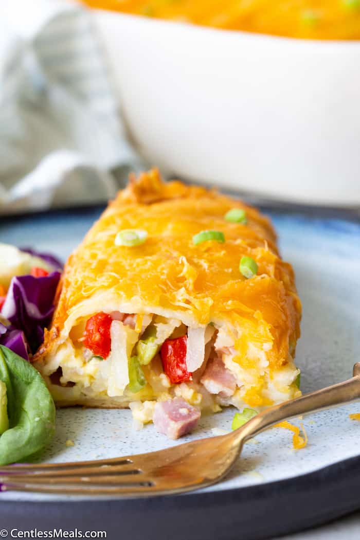 a serving of make-ahead breakfast enchiladas