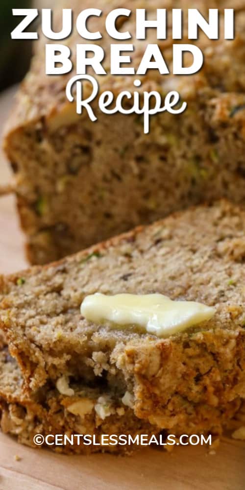 Zucchini Bread sliced with butter melting on the top, with a title.