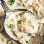 Creamy Crock Pot Chicken in a silver ladle