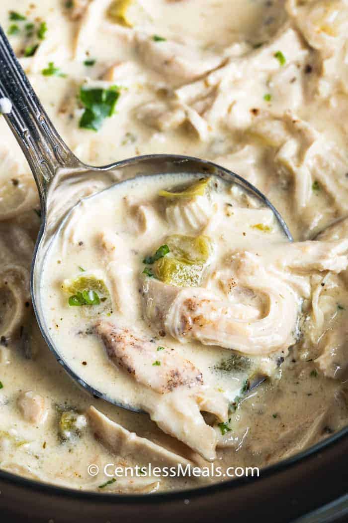 Creamy Crock Pot Chicken in a silver ladle