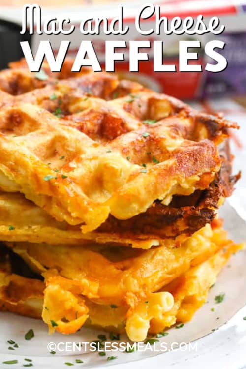 Mac and cheese waffles on a white plate garnished with parsley with a title.