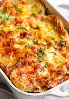 Enchilada Casserole in a white casserole dish