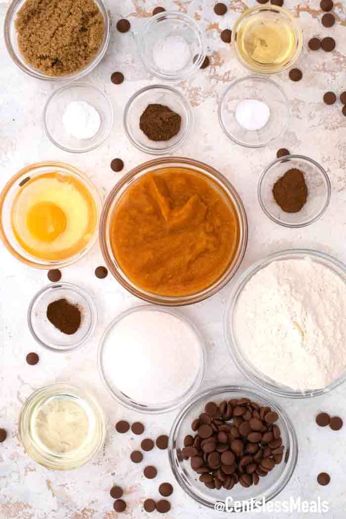 chocolate chip pumpkin muffins ingredients on a white background.