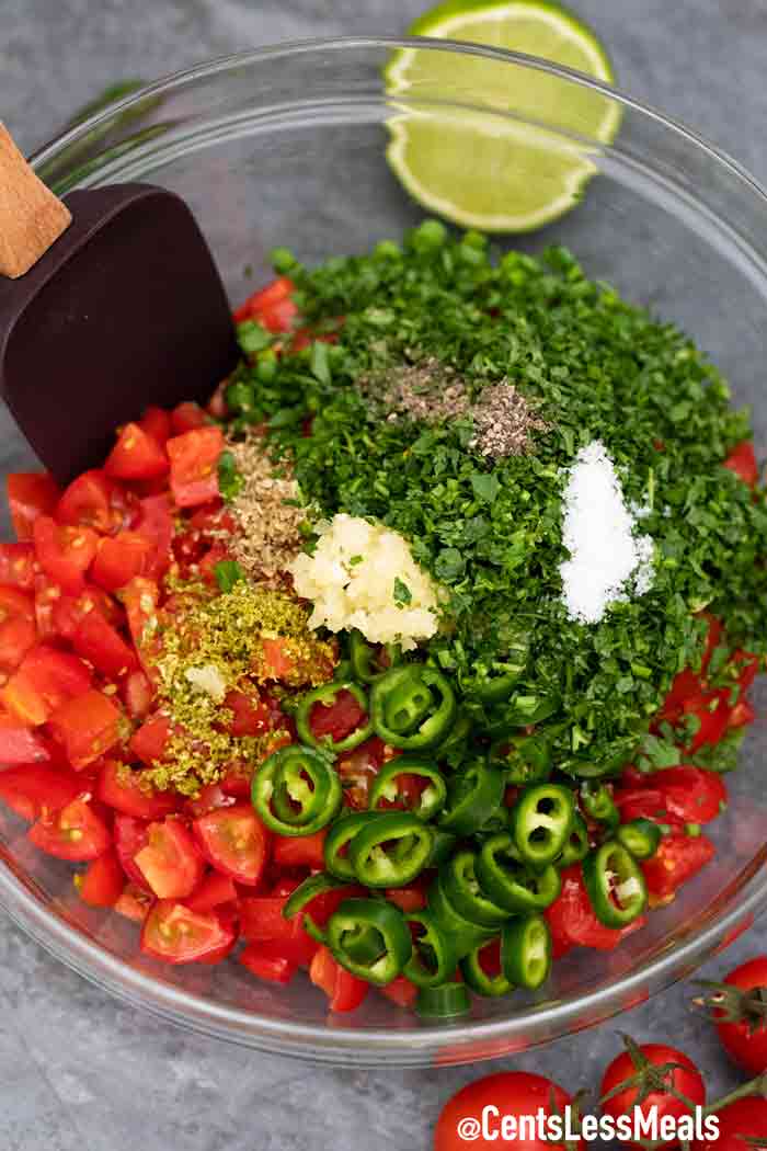 salsa ingredients in a clear bowl