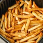 Air Fryer Frozen Fries in the air fryer after cooking