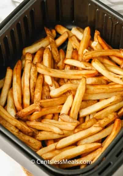 Air Fryer Frozen Fries in the air fryer after cooking