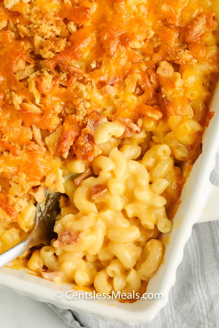top view of finished Creamy Macaroni & Cheese Casserole with a spoon