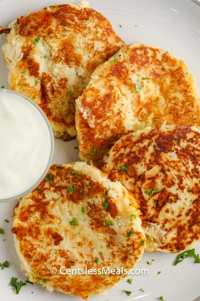 top view of Loaded Mashed Potato Pancakes on a plate