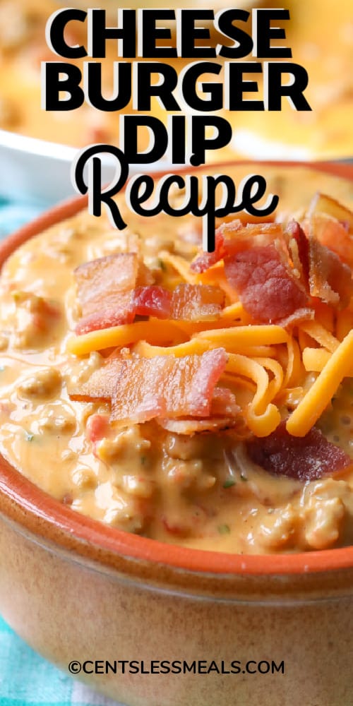 Bacon cheeseburger dip in a bowl with bacon and cheese on top with a title