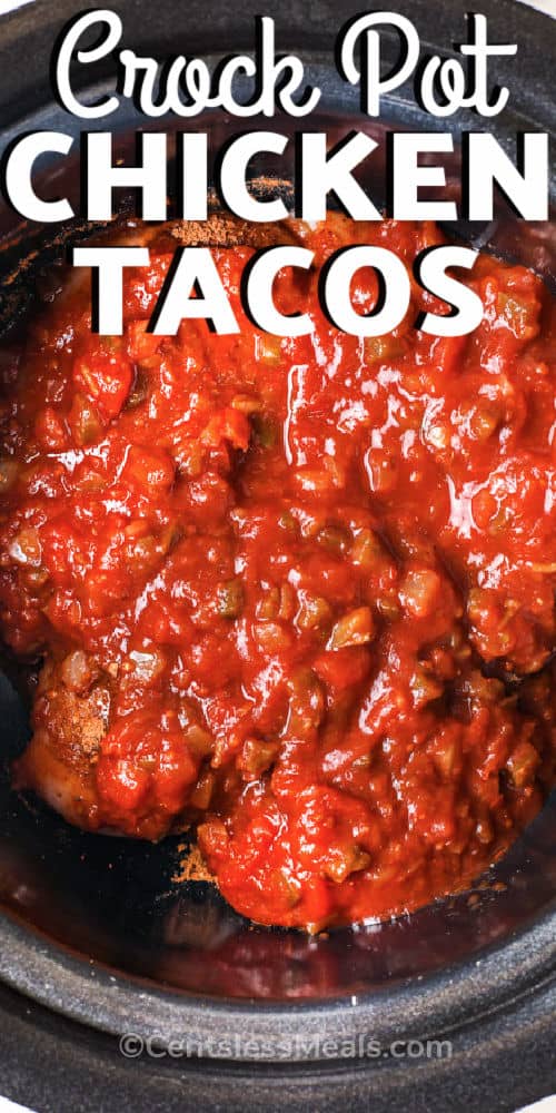 salsa and chicken in crock pot to make Crock Pot Chicken Tacos with a title