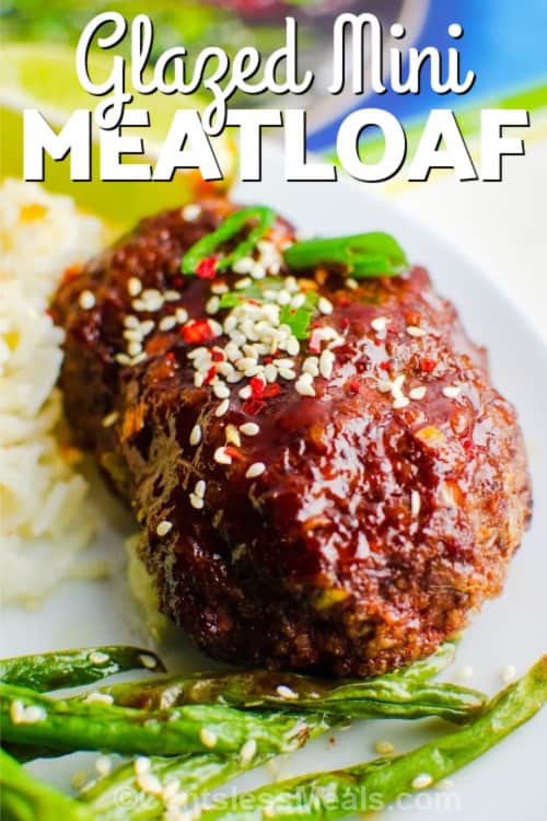 Mini Meatloaves with a Sweet Chili Glaze on a white plate with writing