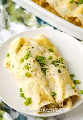 Sour Cream Chicken Enchiladas on a plate