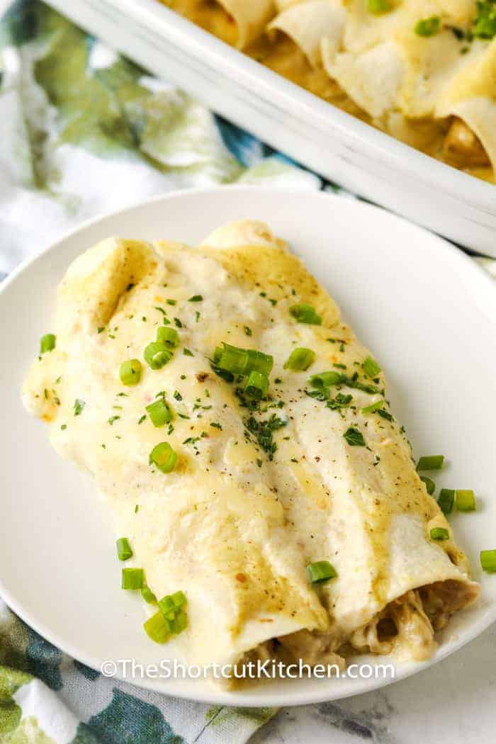 Sour Cream Chicken Enchiladas on a plate