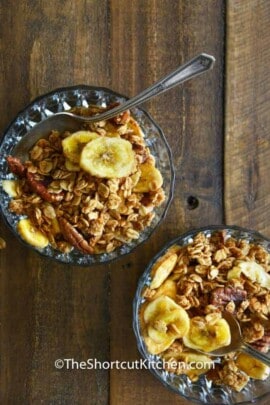 top view of Banana Bread Granola in a bowl with a spoon