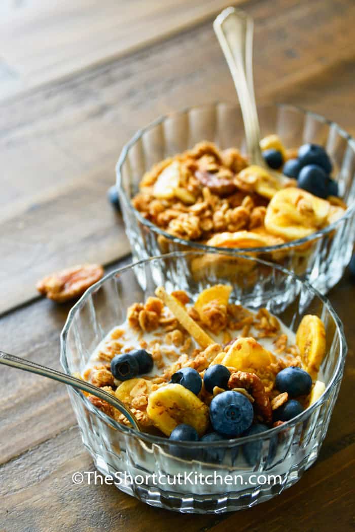 bowls of Banana Bread Granola with spoons in it