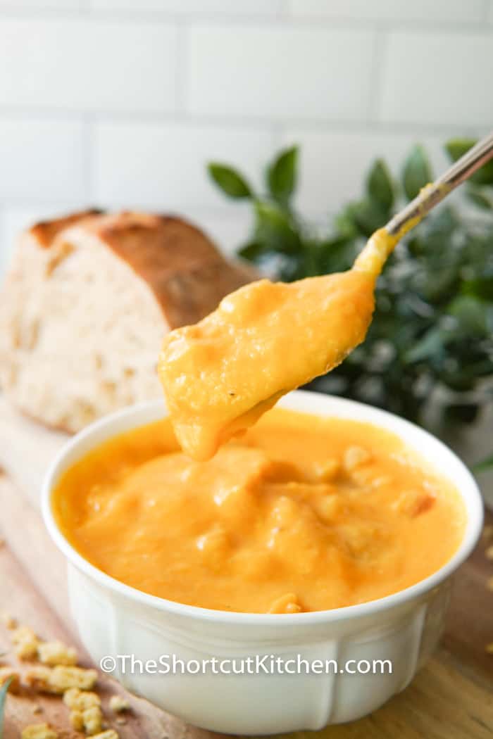 Creamy Butternut Squash Soup in a bowl with a spoon full