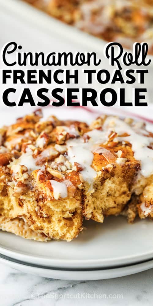 slice of Cinnamon Roll French Toast Casserole on a plate with writing