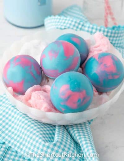 Cotton Candy Hot Cocoa Bombs in a bowl