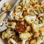 plated Roasted Cauliflower with a spoon
