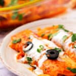 Southwest Shredded Chicken Enchiladas on a plate