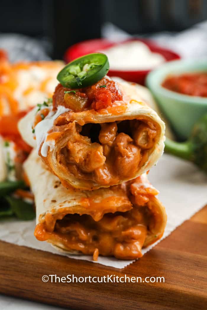 Air Fryer Frozen Burrito in half to show filling