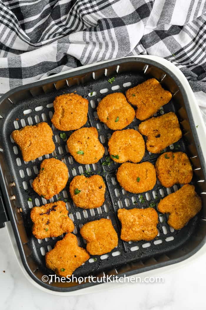 Air Fryer Frozen Chicken Nuggets cooked in the air fryer