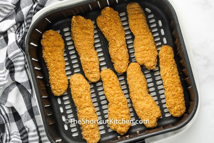 Air Fryer Frozen Chicken Tenders in air fryer before cooking