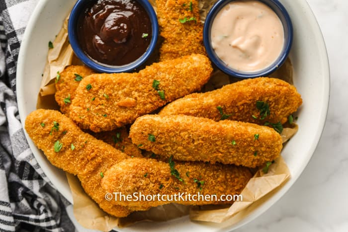 plated Air Fryer Frozen Chicken Tenders with dips