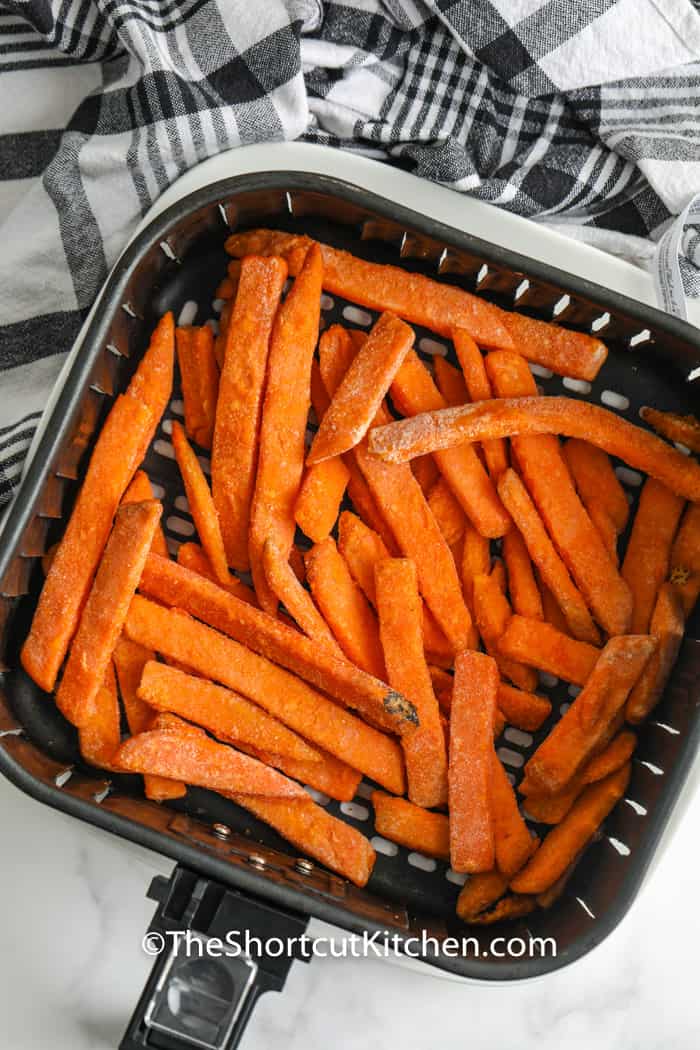 top view of Air Fryer Frozen Sweet Potato Fries in the air fryer before cooking