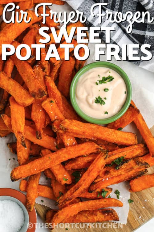 cooked Air Fryer Frozen Sweet Potato Fries with dip and writing