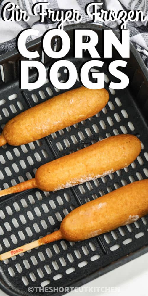 Air Fryer Frozen Corn Dogs in the air fryer with a title