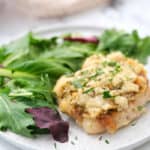 plated Smothered Pork Chops with salad