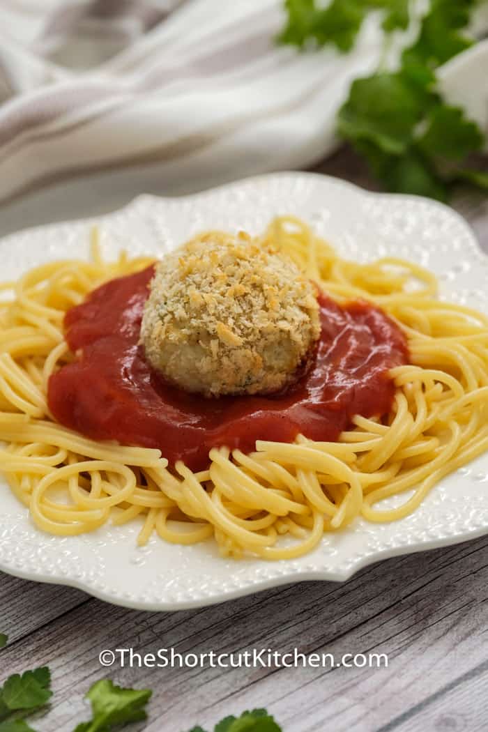 Chicken Parmesan Meatballs on spaghetti