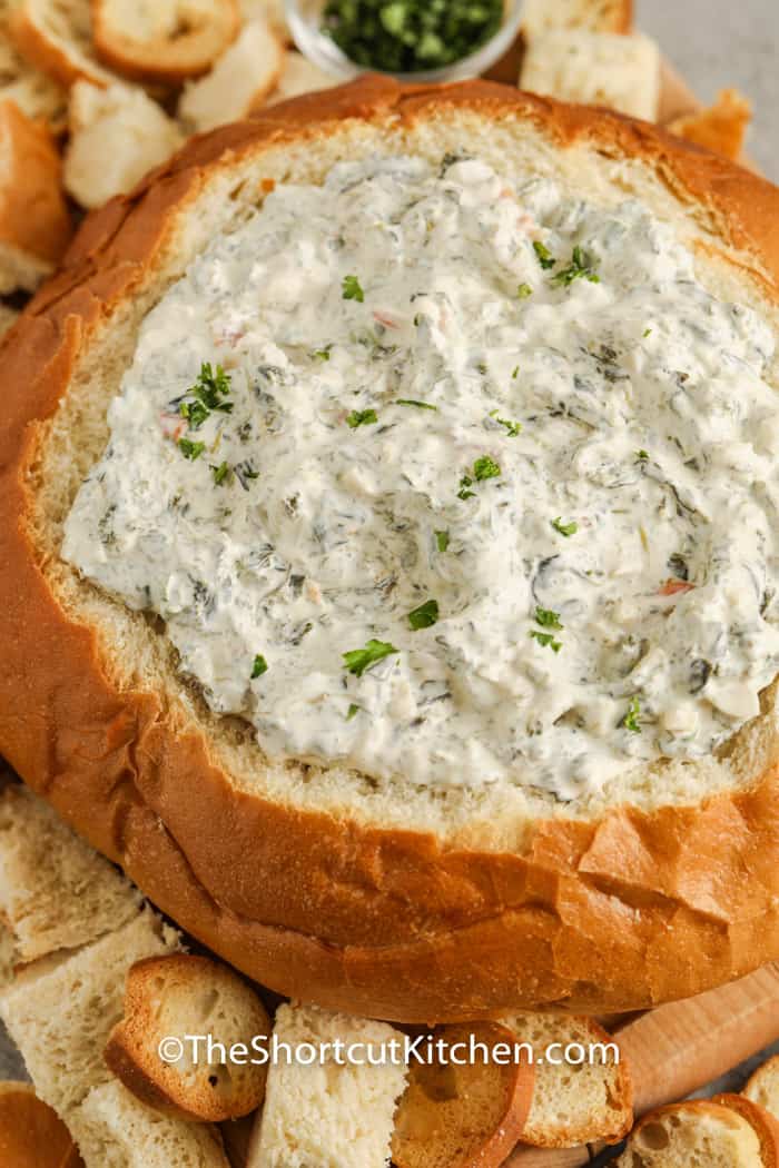 Easy Spinach Dip with bread around it