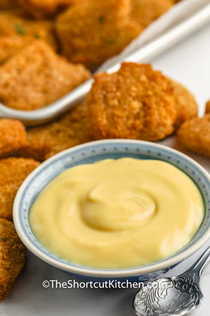 Quick Honey Mustard Sauce Recipe in a dish with chicken nuggets