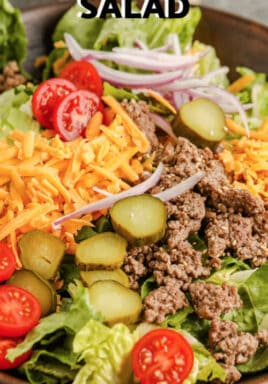 plated Cheeseburger Salad with writing