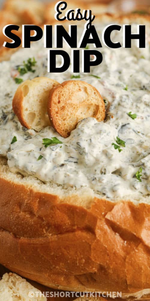 Easy Spinach Dip in a bread bowl with a title