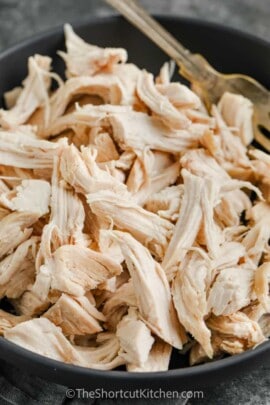 Easy Shredded Chicken in a pan with a fork