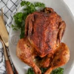 cooked rotisserie chicken with parsley