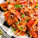 Sausage and Peppers Pasta with cheese on a plate with a fork