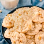 close up of White Chocolate Macadamia Nut Cookie Recipe baked on a. plate