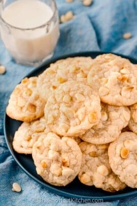 close up of White Chocolate Macadamia Nut Cookie Recipe baked on a. plate