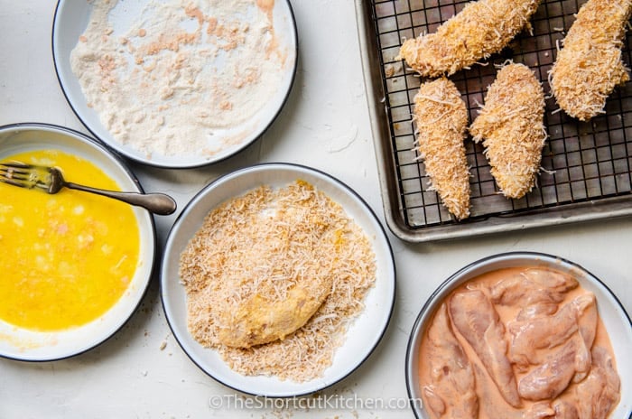 the steps to coat Crispy Coconut Chicken Strips