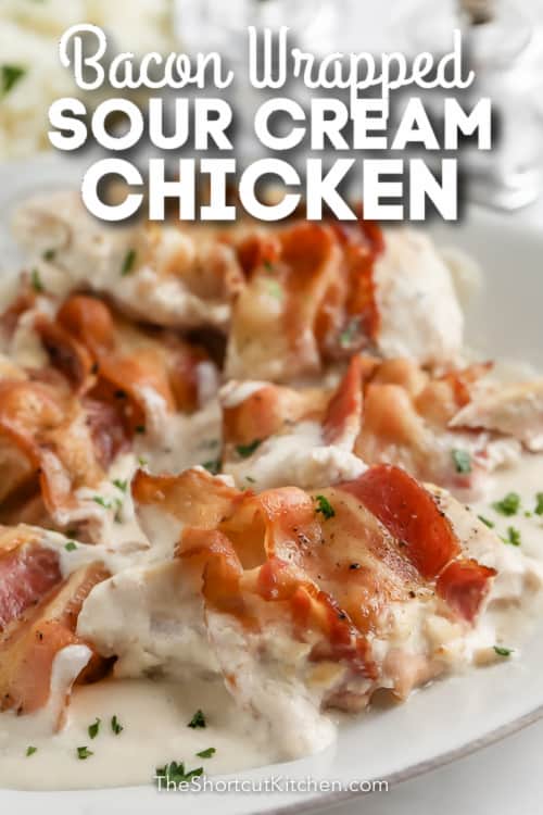 bacon wrapped sour cream chicken on a plate with text