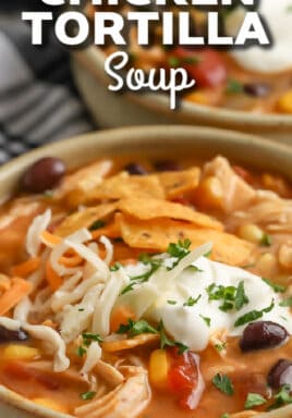crock pot chicken tortilla soup topped with sour cream with text