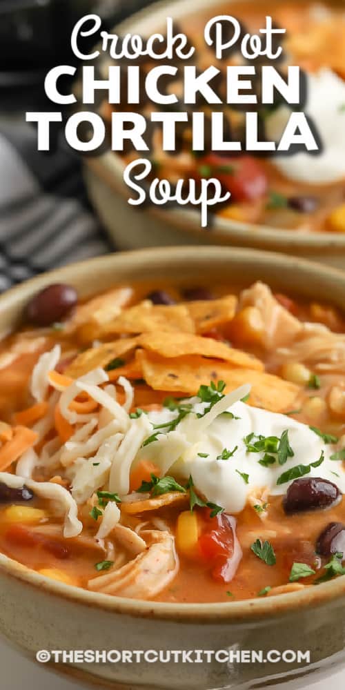 crock pot chicken tortilla soup topped with sour cream with text