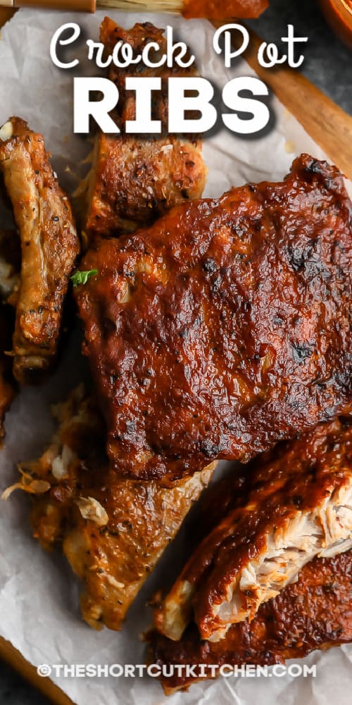 crock pot ribs on parchment paper with text