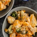 top view of cheesy chicken vegetable casserole in a bowl